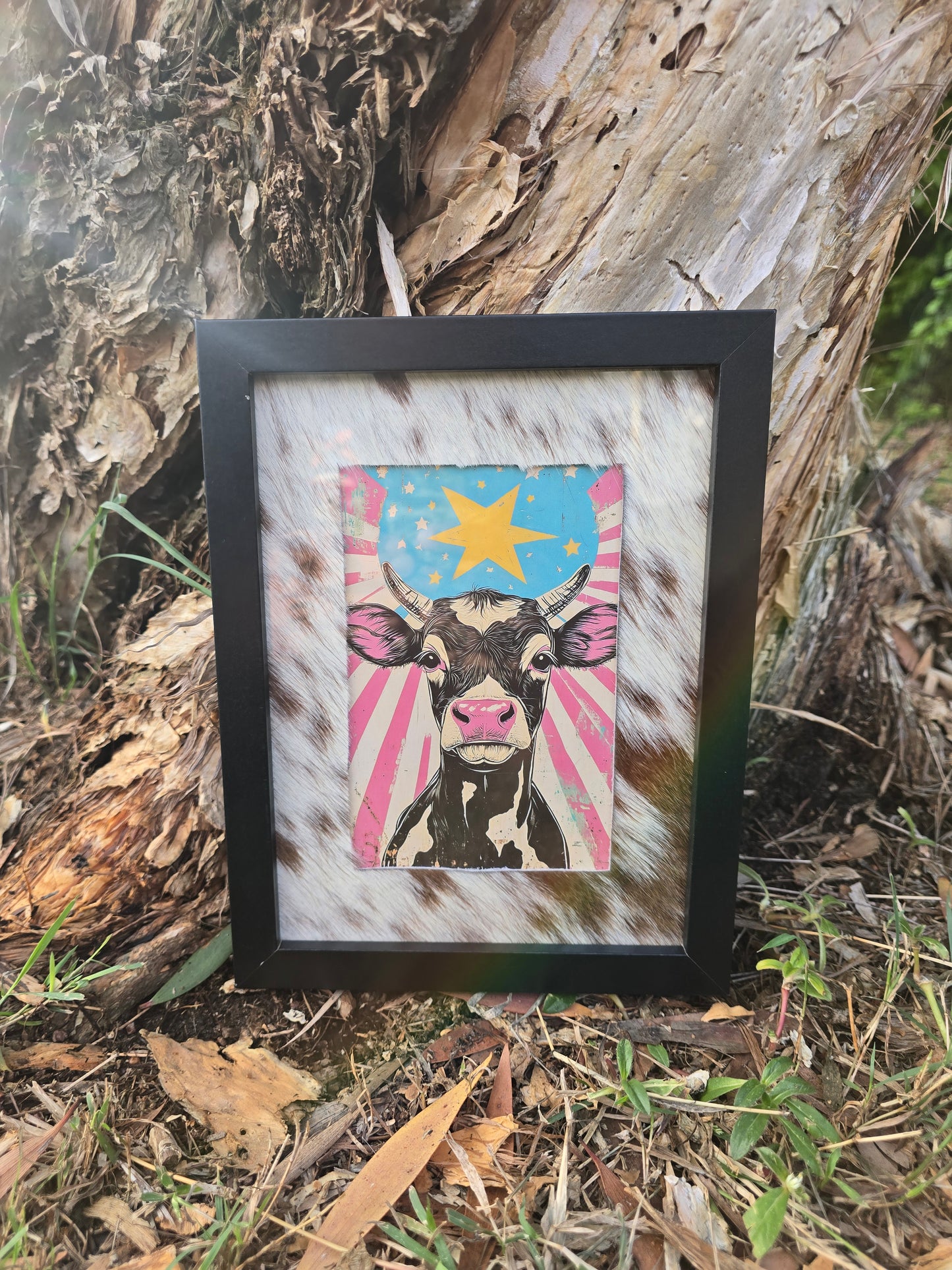 Cowhide frame with cow print