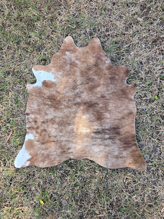 The in-betweener cowhide rug (approx 60cm x 60cm)
