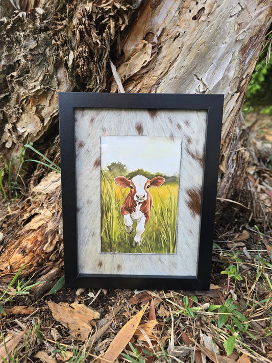 Cowhide frame with cow print
