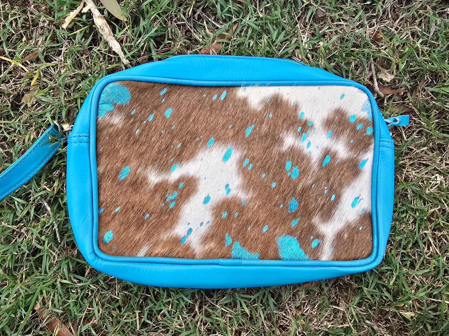 Cowhide with acid wash toiletry bag