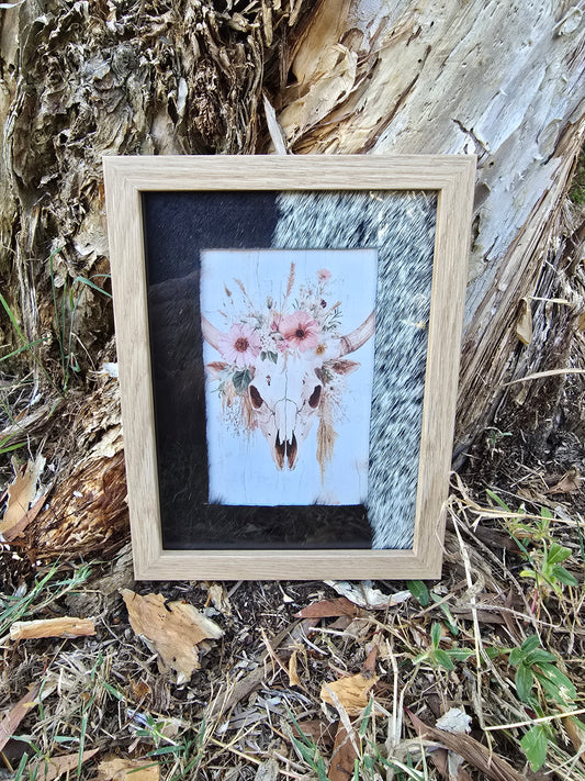 Cowhide frame with cowskull print