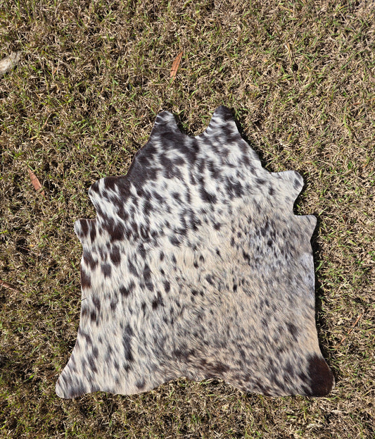 The in-betweener cowhide rug (approx 60cm x 60cm)