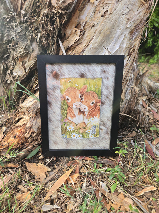 Cowhide frame with cows print